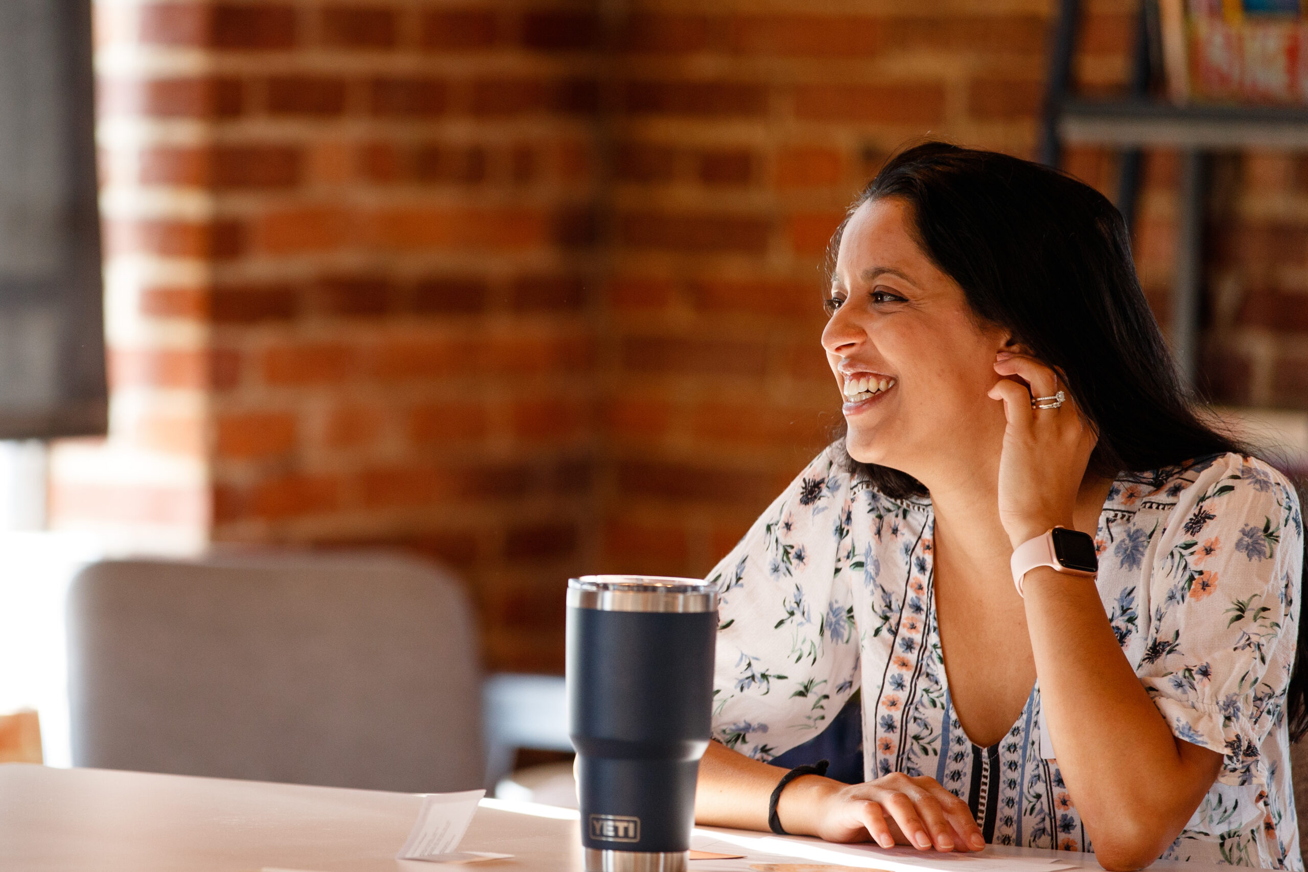 Volunteer listens intently at orientation
