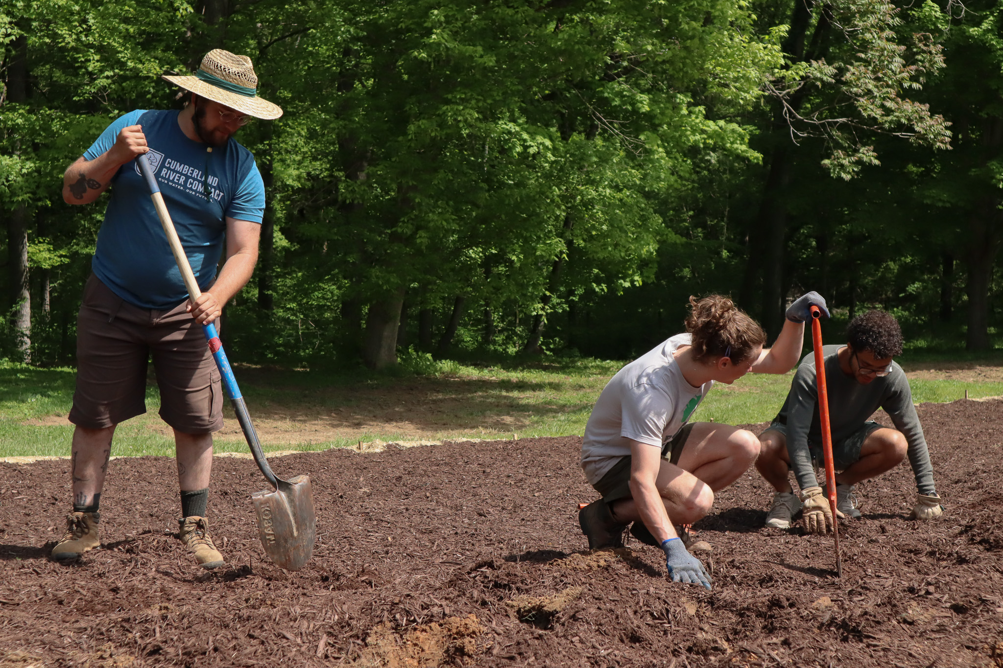 Compact staff prepare a Pocket Prairie plot in Clarksville for planting.