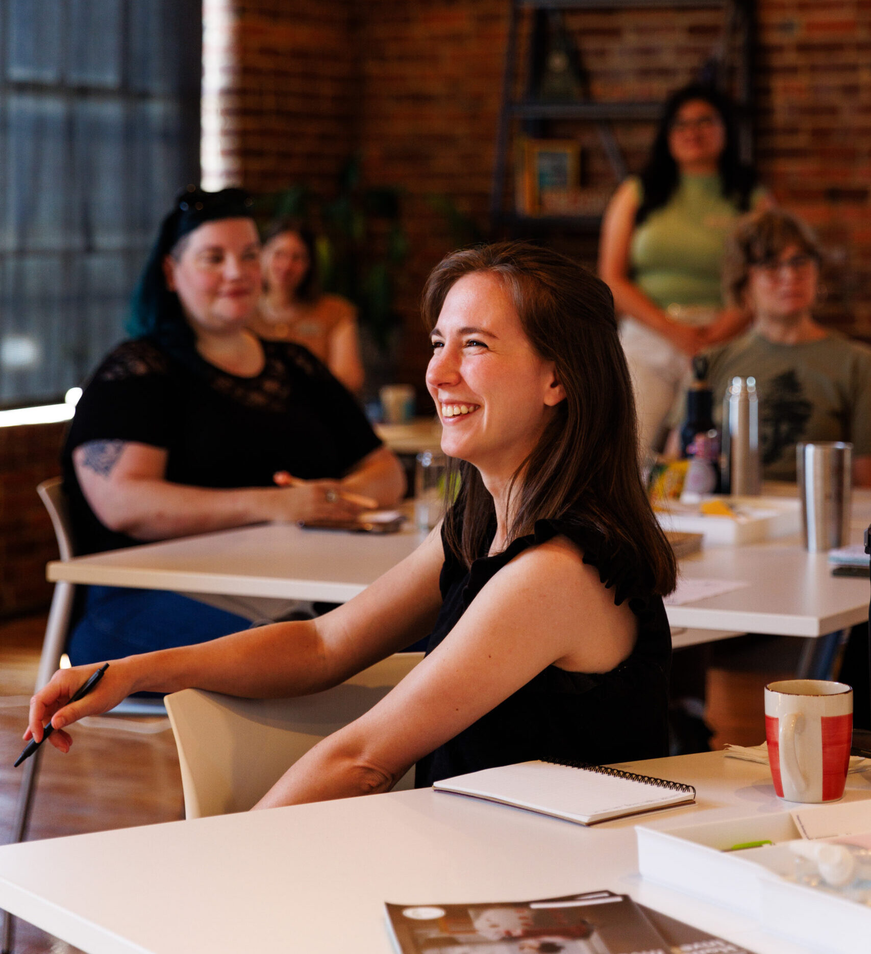 Smiling woman attending a training