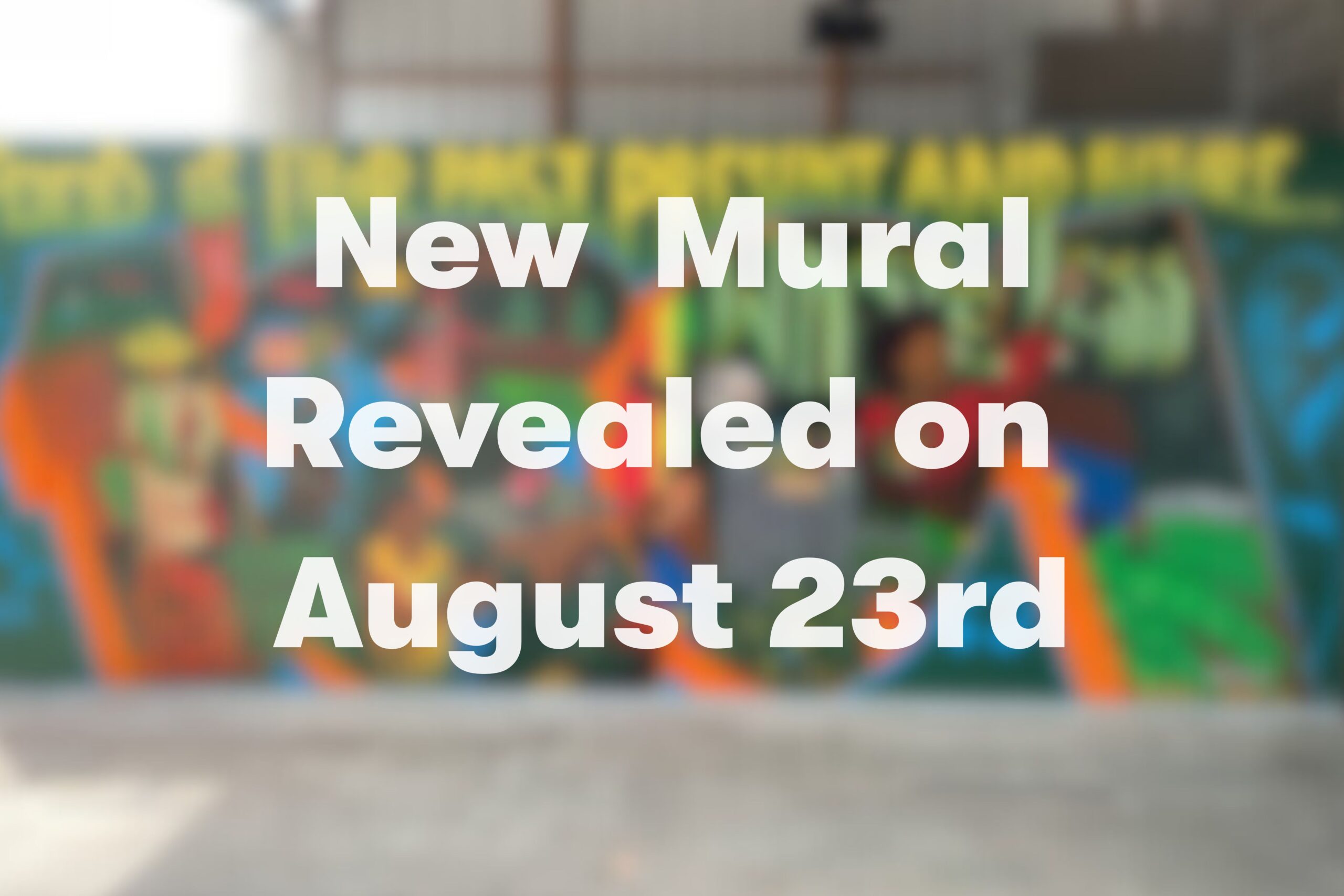 blurred background with text: new mural revealed on august 23rd