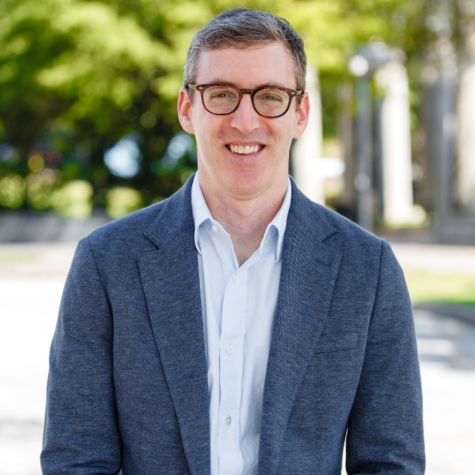 Picture of Todd Lawrence standing in an urban park