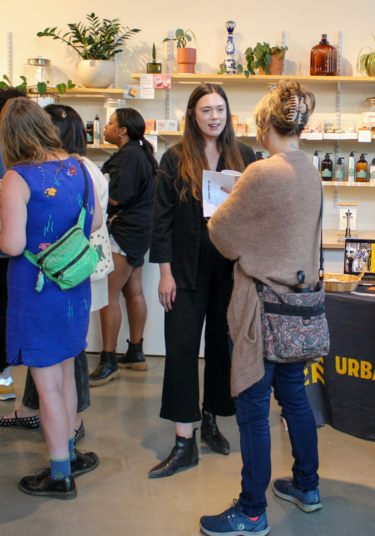 A group of people standing and networking at a Roundtable event