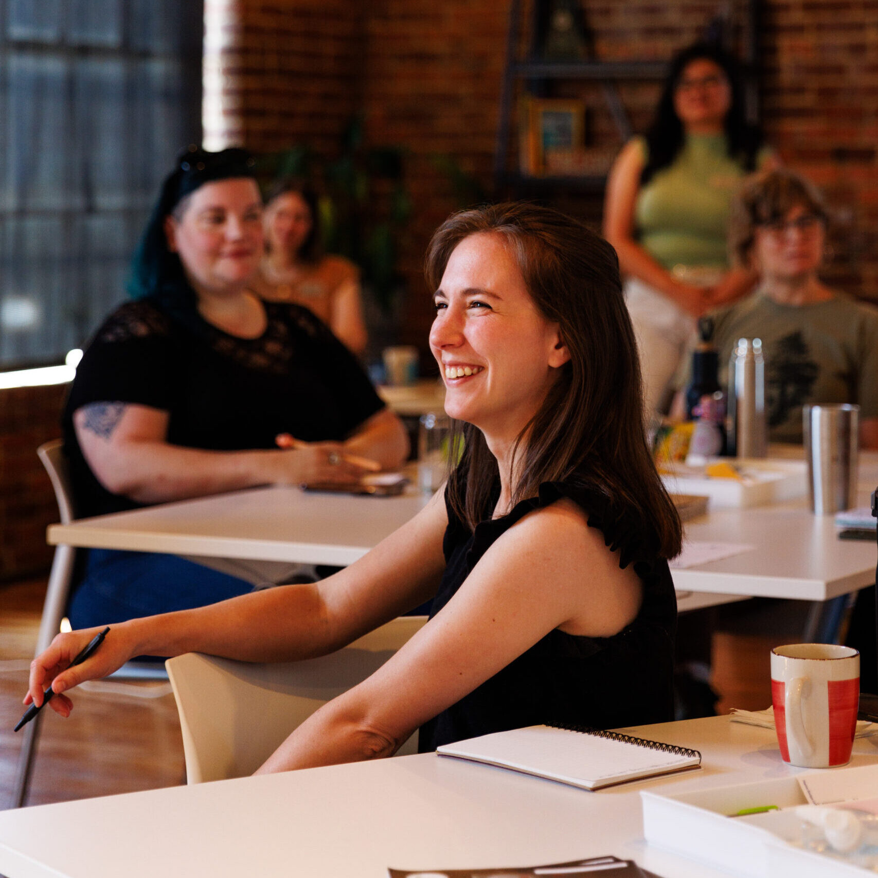 Smiling woman attending a training