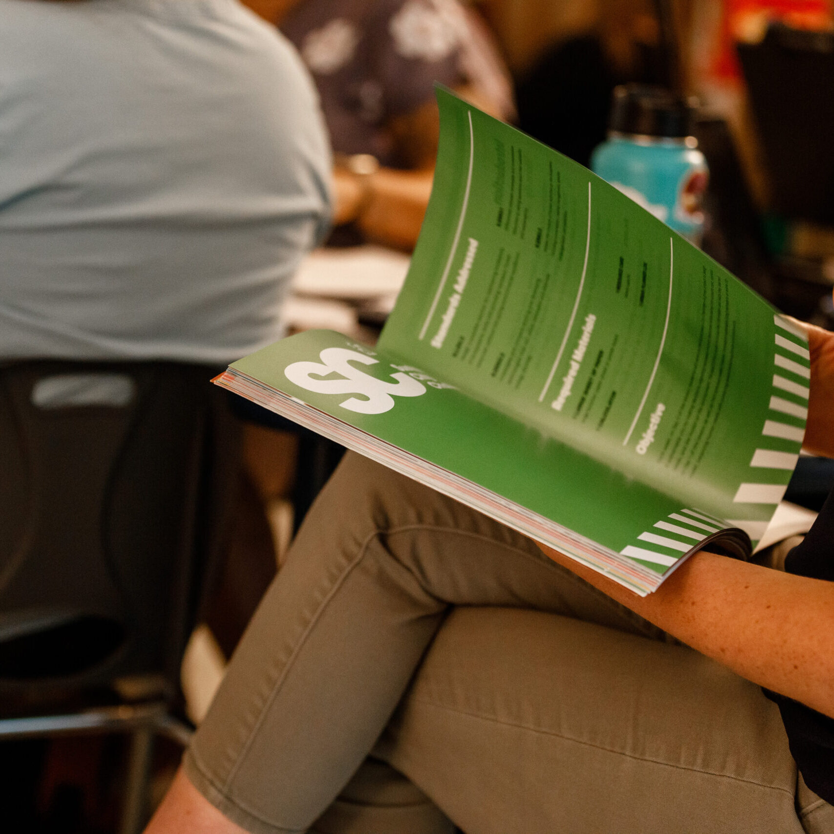 Person reading the Sustainable Classrooms curriculum