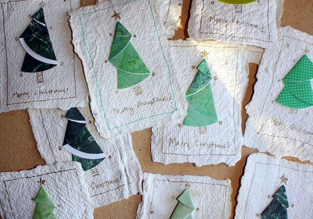 Seed paper holiday cards with evergreen trees on the front